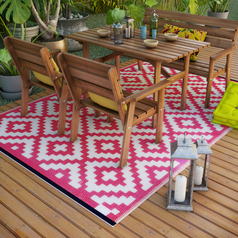 pink and green outdoor rug